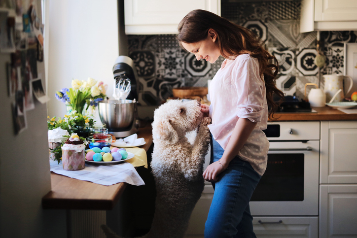Easter picture with a pet and a young woman